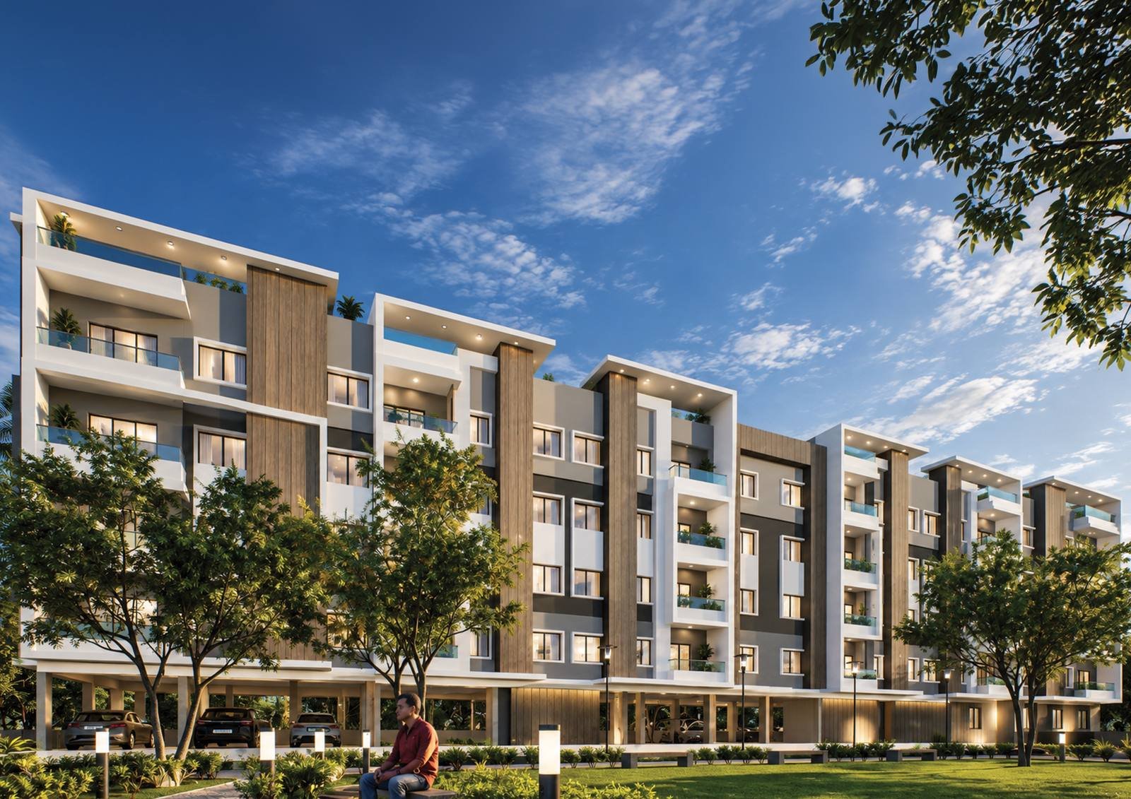 Daytime view of INFINITY’s architecture and landscaped entrance